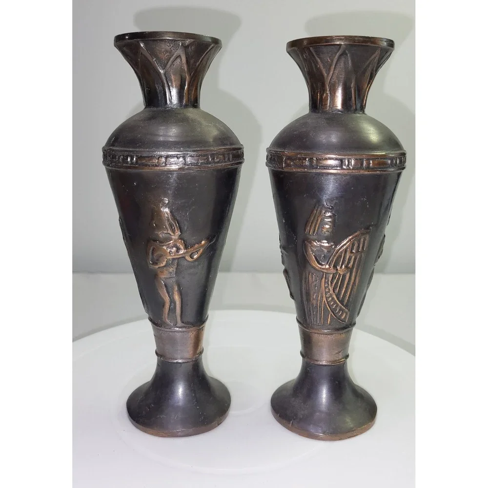 Vintage Egyptian Motifs Metal Vases Pair Black Bronze Embossed Figures
